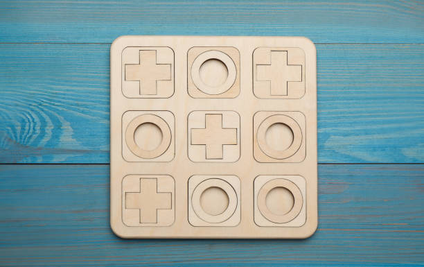 Tic tac toe game with letters, isolated on white background.