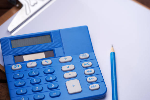clipboard with blank paper and calculator