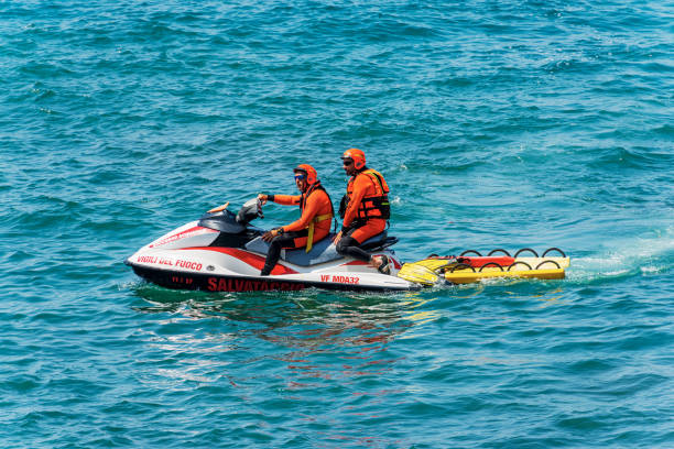 Patrol of Italian Lifeguards with a Jet Ski - Mediterranean Sea Liguria Italy stock photo