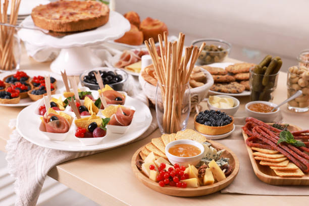 istock Dishes with different food on table indoors. Luxury brunch 1412861638