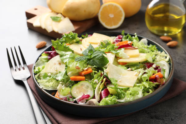 istock Delicious turnip salad served on grey table, closeup 1412861707