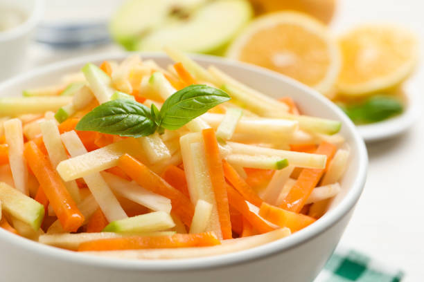 istock Delicious turnip salad with apple and basil in bowl, closeup 1412862004