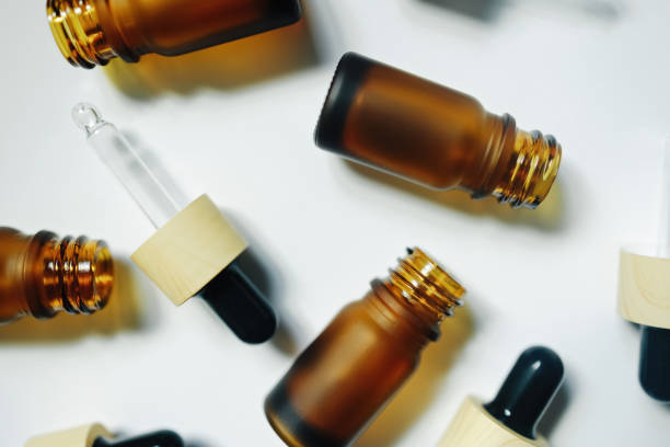 istock Amber bottle with serum or essential oil 1412862262