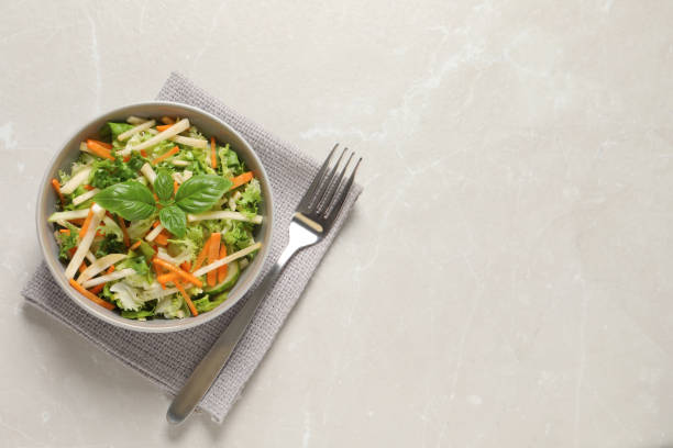 istock Delicious turnip salad served on light grey table, flat lay. Space for text 1412863054