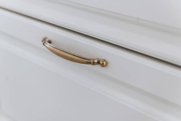 istock metal handles for opening on white doors 1412866445