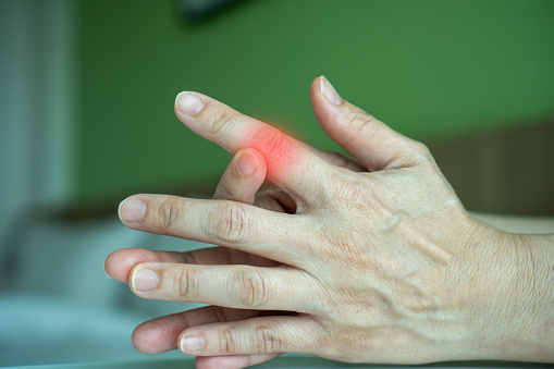 Hand Problems Pic Trigger Finger Overuse Hand Problems Womanâs Hand With Red Spot O ...