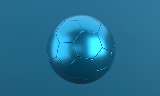 Blue metallic soccer ball on blue background. Sports concept.