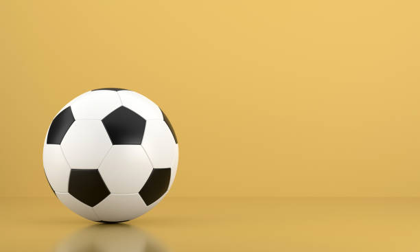 istock Soccer Ball on Orange Background 1412869408
