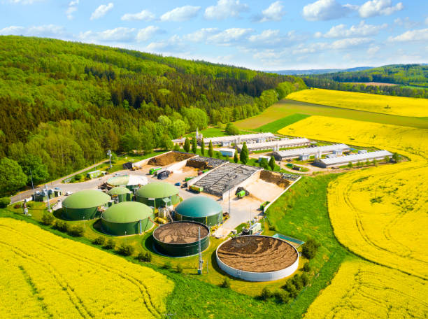 istock Biogas plant in agricultural landscape. 1412869437