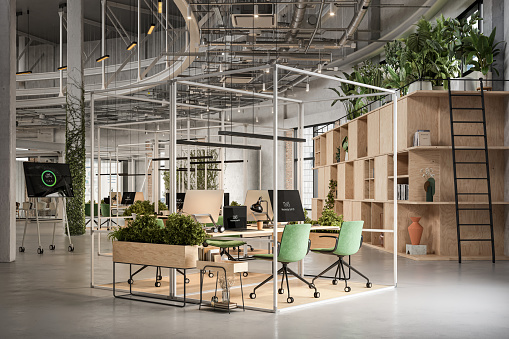 Computer generated image of an open plan office interior with many plants in the work desks. Modern office desk with computers.