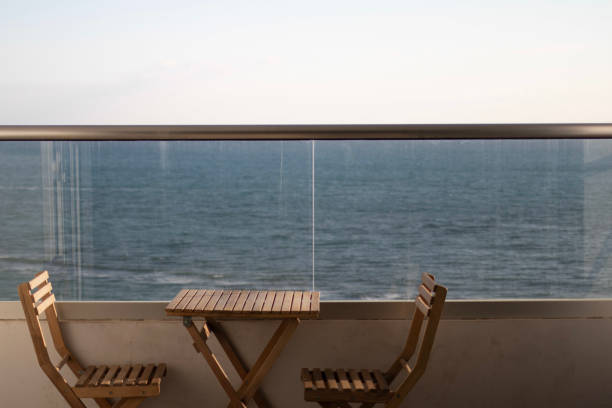 istock Cozy place at the balcony with sea background 1412875454