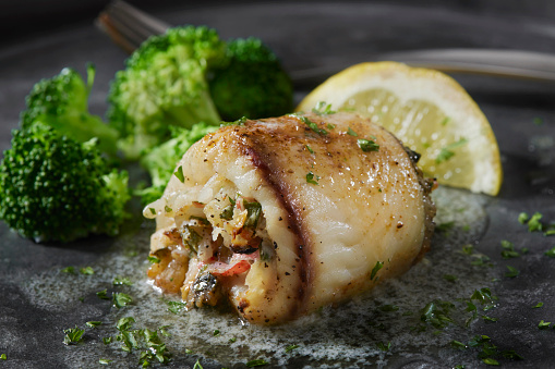 Creamy Crab Stuffed Tilapia in a Lemon, Garlic and Butter Sauce with Steamed Broccoli