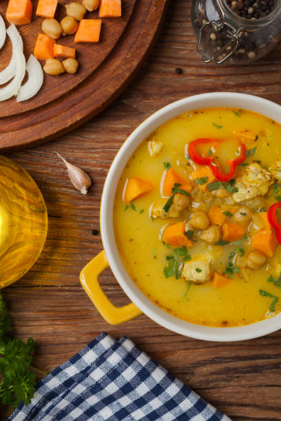 istock Sweet potato soup with chicken and lentils. 1412876478