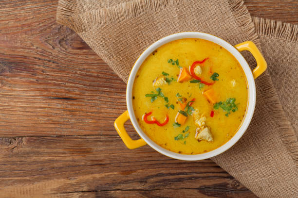 istock Sweet potato soup with chicken and lentils. 1412877218