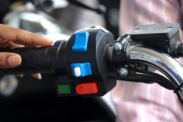 istock Different type of control switches on a bike handle or handlebar with hands touching them 1412877446