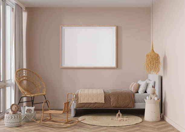 istock Empty horizontal picture frame on beige wall in modern child room. Mock up interior in boho style. Free, copy space for your picture. Bed, rattan chair, toys. Cozy room for kids. 3D rendering. 1412879672
