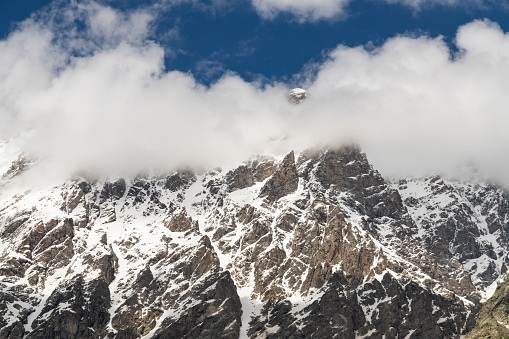 swiss alps mountain range in the clouds, titlis, switzerland.