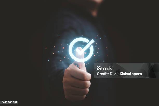 Businessman Hand Thumb Up With Virtual Correct Sign Or Tick Mark For Approve Quality Assurance And Guarantee Concept Stock Photo - Download Image Now