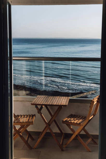 istock Cozy place at the balcony with sea background 1412882450