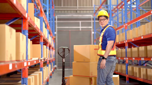 istock Warehouse senior staff portrait. 1412885875