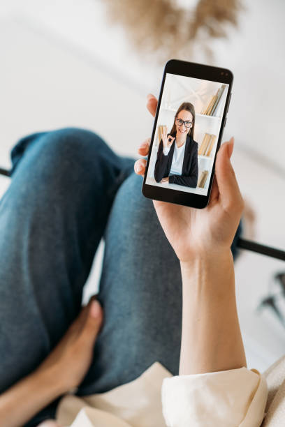 istock mobile video call web negotiation female partners 1412886025