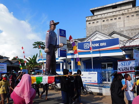 West Bangka Regency, Indonesia - August 20 2016:  a police statue made of paper on village carnival in celebration of Indonesia's independence day, 17 August.