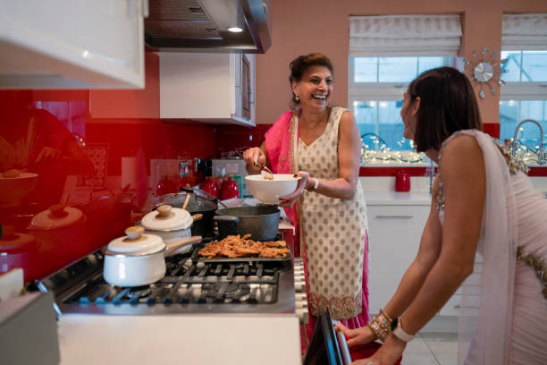 istock Family Cooking Together 1412889487