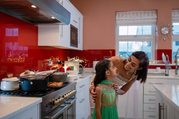 istock Mother And Daughter In The Kitchen 1412889492