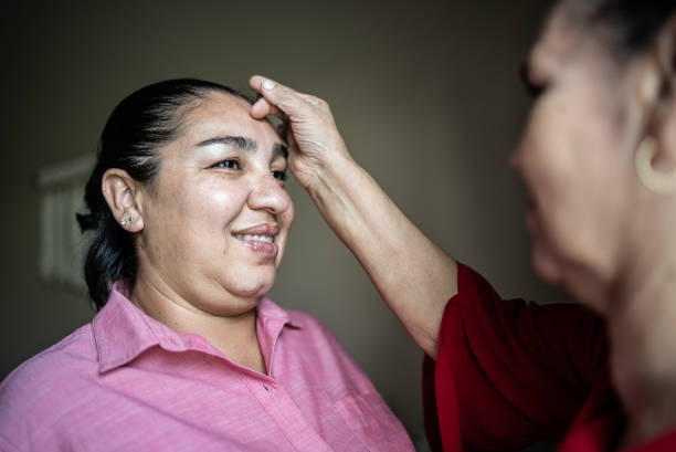 istock Mother blessing her daughter at home 1412893366