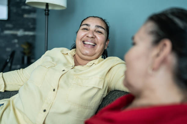 istock Mother and daughter talking at home 1412893402