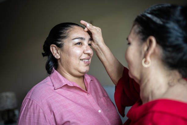 istock Mother blessing her daughter at home 1412893404