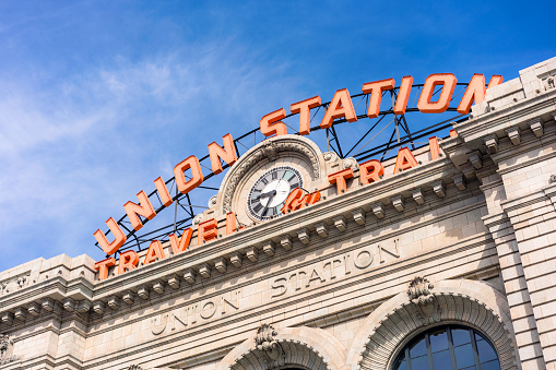 A large sign above the entrance to Denver's Union Station, the city's main train station, located downtown.