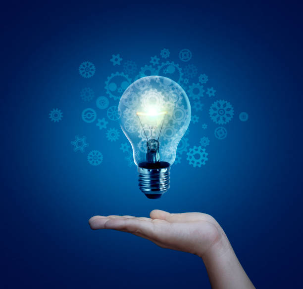 istock Light bulb in hand, new ideas with innovative technology and creativity. creative idea with sparkling light bulbs 1412894896