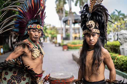 Portrait of aztec performers outdoors