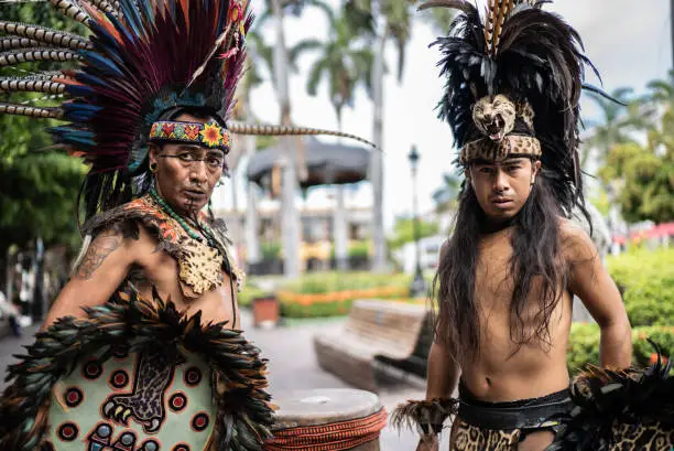 Portrait of aztec performers outdoors