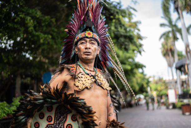 istock Aztec performer looking away outdoors 1412895838