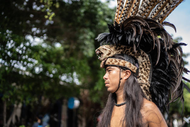 istock Aztec performer looking away outdoors 1412895842
