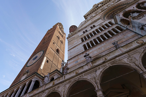 Cremona, Italy - June 26, 2022: Exterior of the medieval cathedral (duomo) of Cremona, Lombardy, Italy