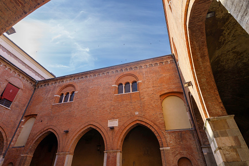 Cremona, Italy - June 26, 2022: Exterior of the medieval Palazzo del Comune in Cremona, Lombardy, Italy