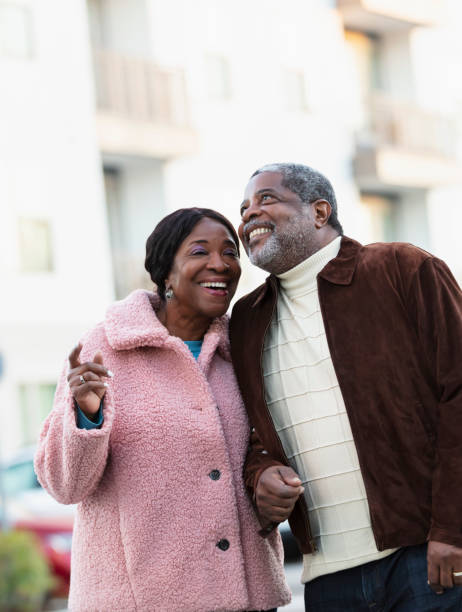 istock Senior African-American couple outdoors, smiling 1412902746