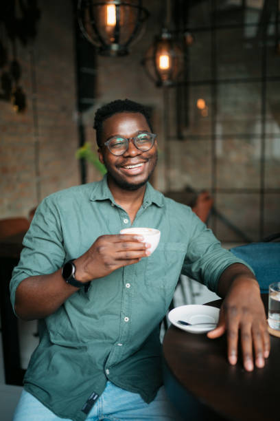 istock Enjoying a cup of coffee in a coffee shop 1412903627