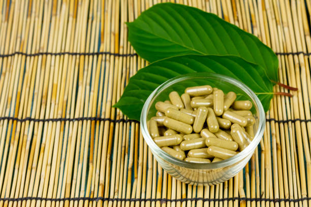 istock Mitragyna Speciosa Korth or kratom capsules. 1412904903