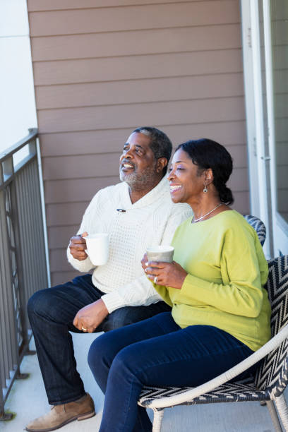 istock Senior African-American couple relaxing on terrace 1412906421