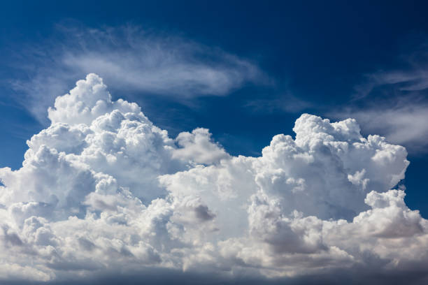 istock Closeup, cumulus clouds. Blue sky in background. 1412906600