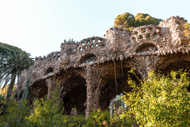 istock Stone columns and trees in Park Guell in Barcelona, Spain 1412911210