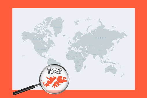 Map of Falkland Islands on political world map with magnifying glass