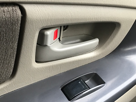 Elegant car interior - door lock and scroll control for the window pane