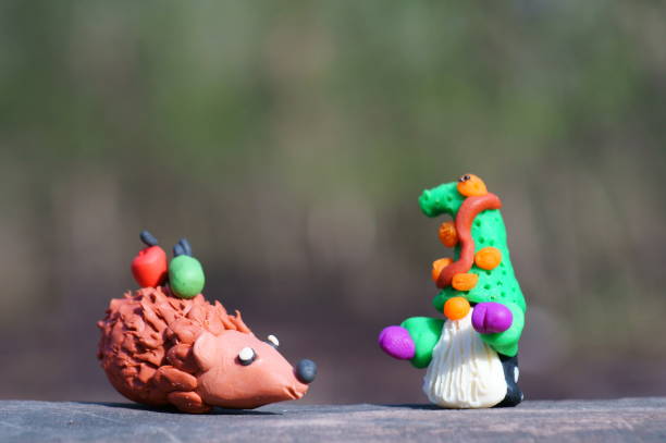 istock A figure of a hedgehog and a dwarf in close-up. 1412925601