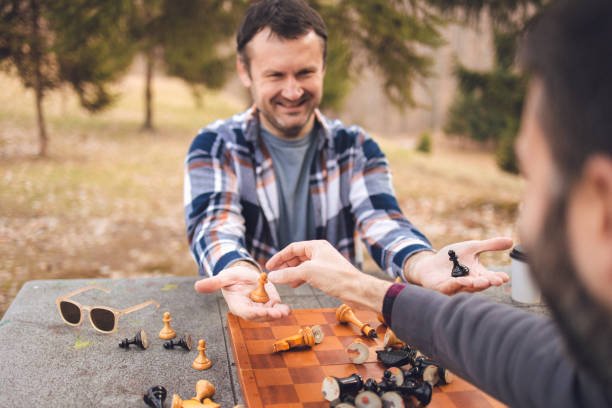 istock Two male friends going outdoors for fun in late autumn time 1412926985
