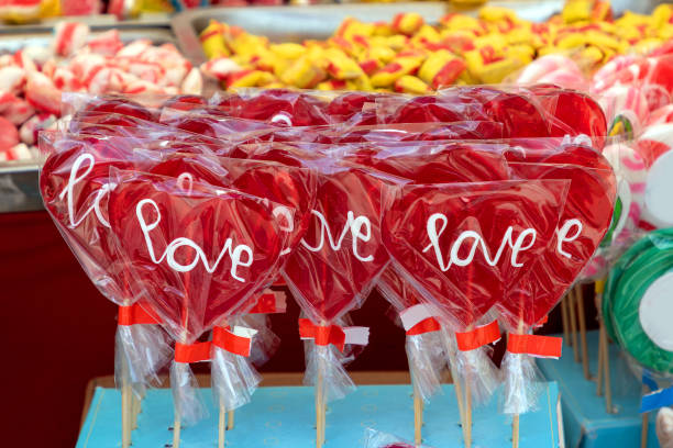 istock Red heart love sign lollipops 1412930055